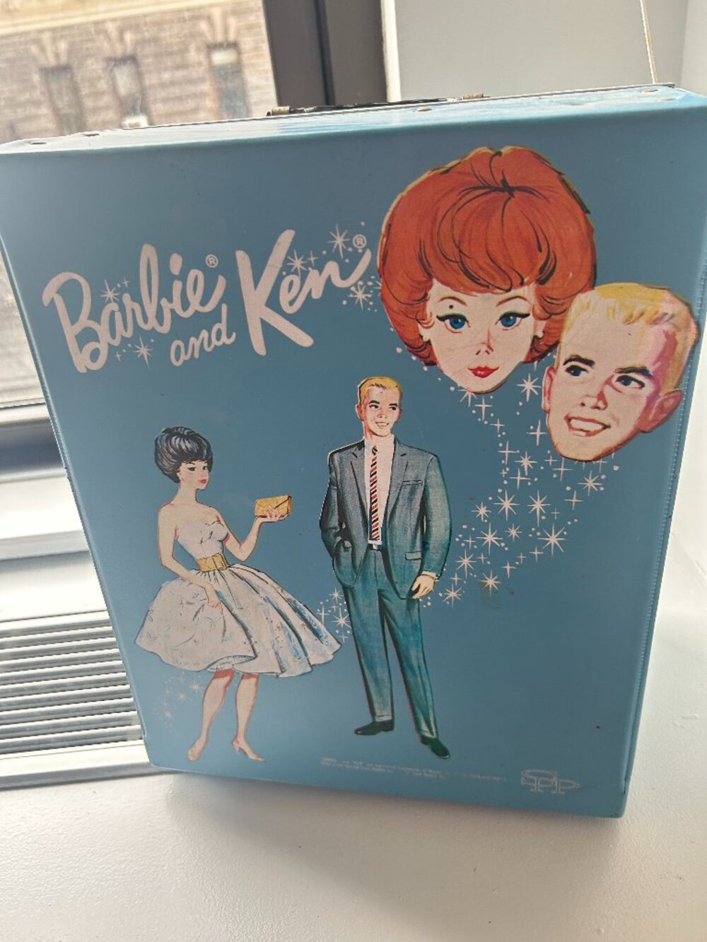 Barbie and Ken doll carrying case.